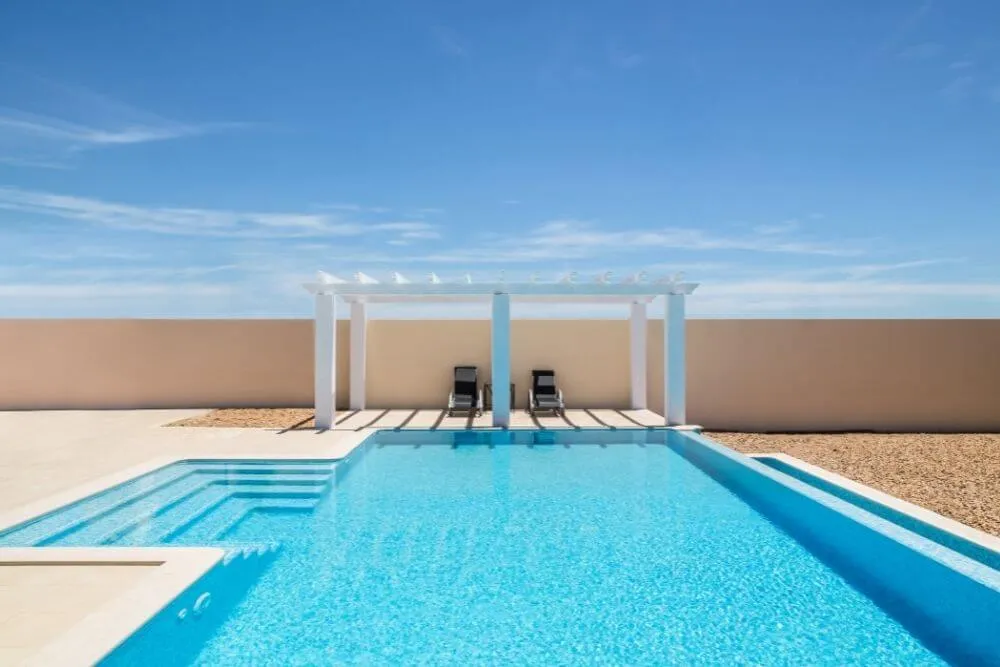 swimming pool with a pergola